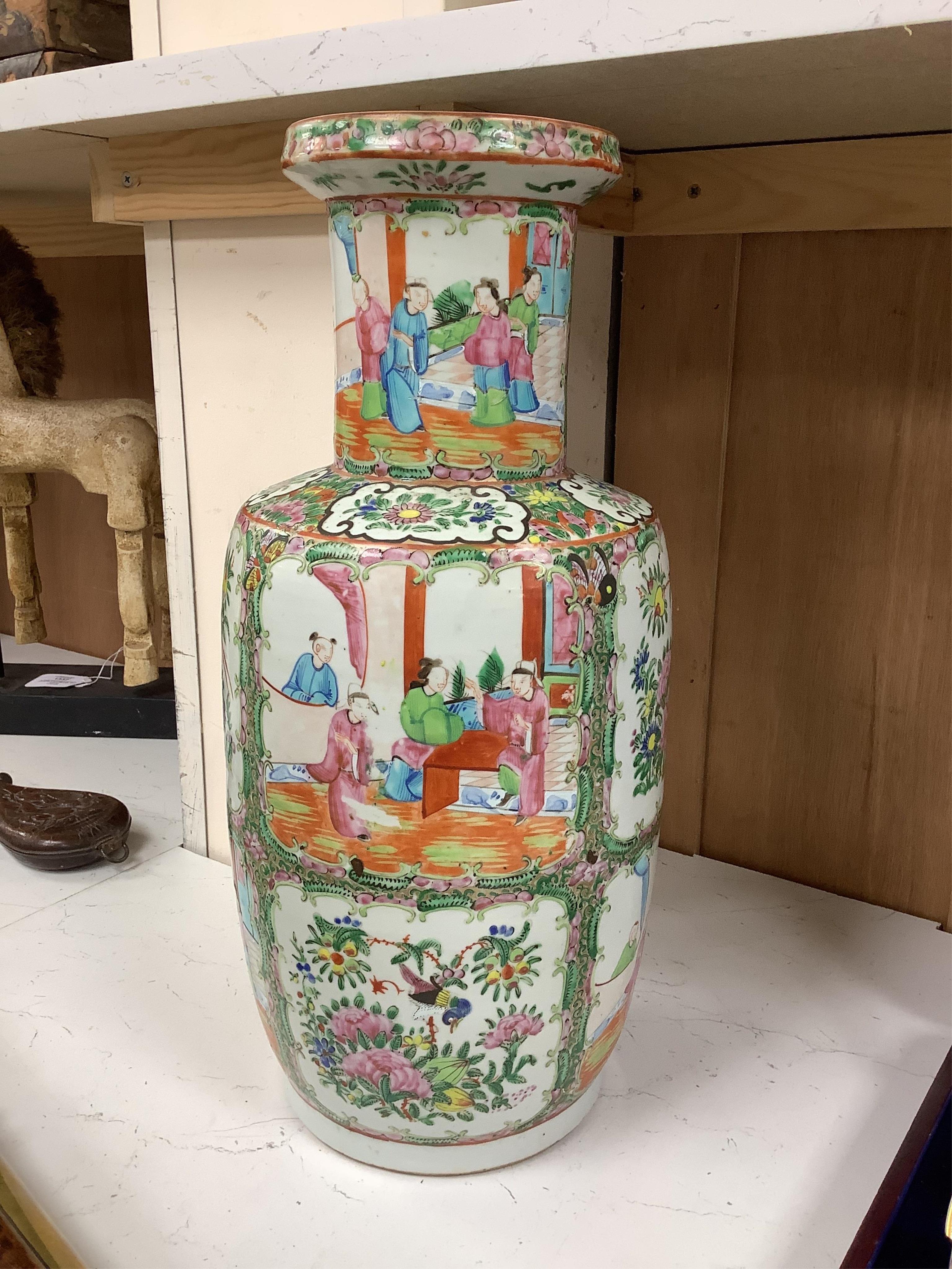 A 19th century Chinese famille rose baluster vase enamelled with flowers and figures, 44cm high